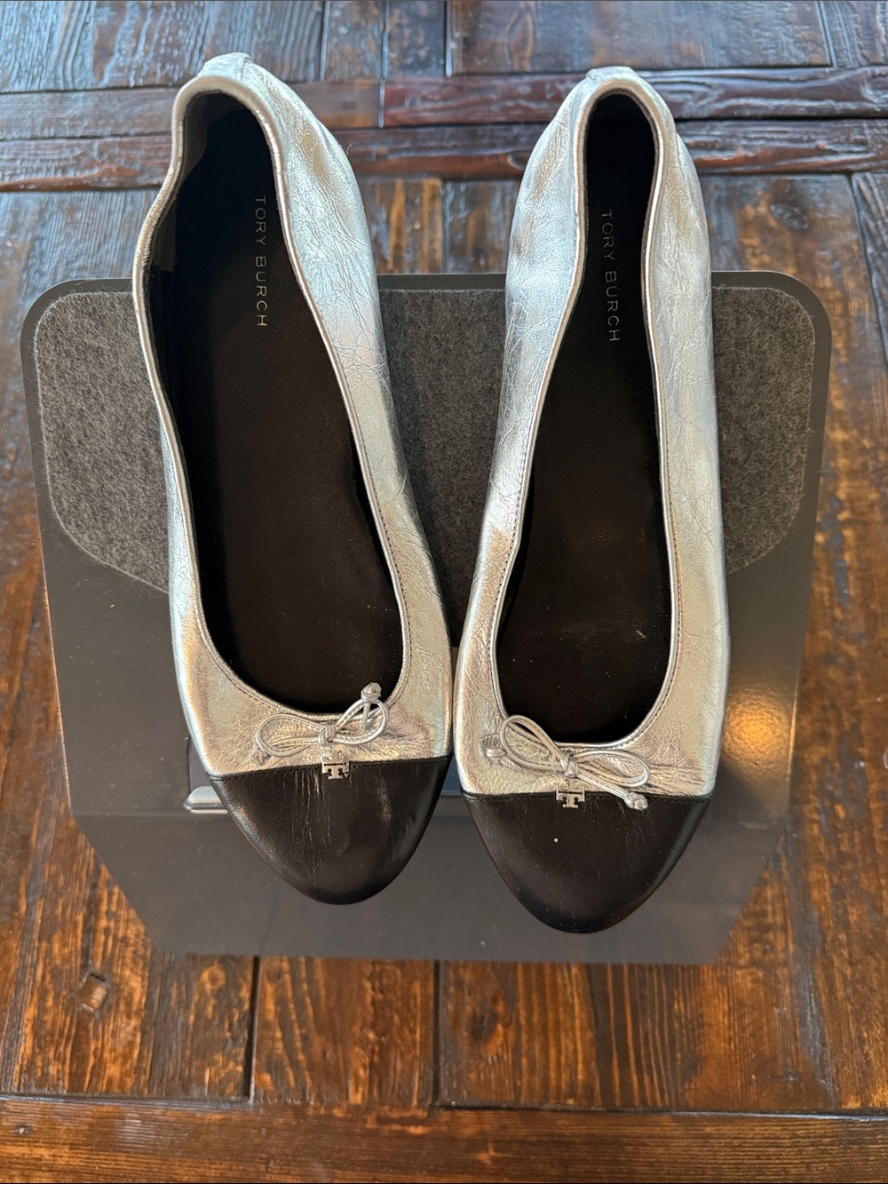 Tory Burch Silver and Black Cap-Toe Ballet Flats with Bow